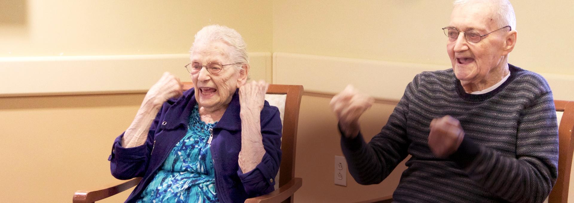 Two elderly people enjoying the moment